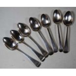 A collection of seven various 19th century and later silver dessert spoons, various dates and