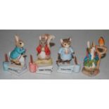 A collection of four Border Fine Arts Society 'The Tales of Beatrix Potter' figures, to include 'The