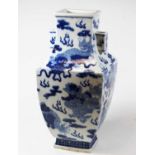 A Chinese blue and white vase of square baluster from, decorated with mythological animals, h.