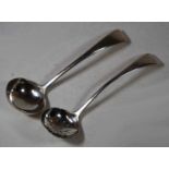 A late Victorian silver sauce ladle, maker Josiah Williams & Co, London 1898; together with one