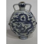 A Chinese export blue and white moon flask, having twin handles and decorated with a dragon