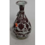 A Chinese export vase, having flared rim to a slender neck and pear shaped lower body, decorated