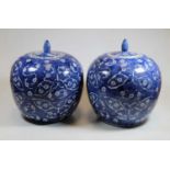 A pair of 20th century Chinese blue and white ginger jars, of globular form, height 25cm