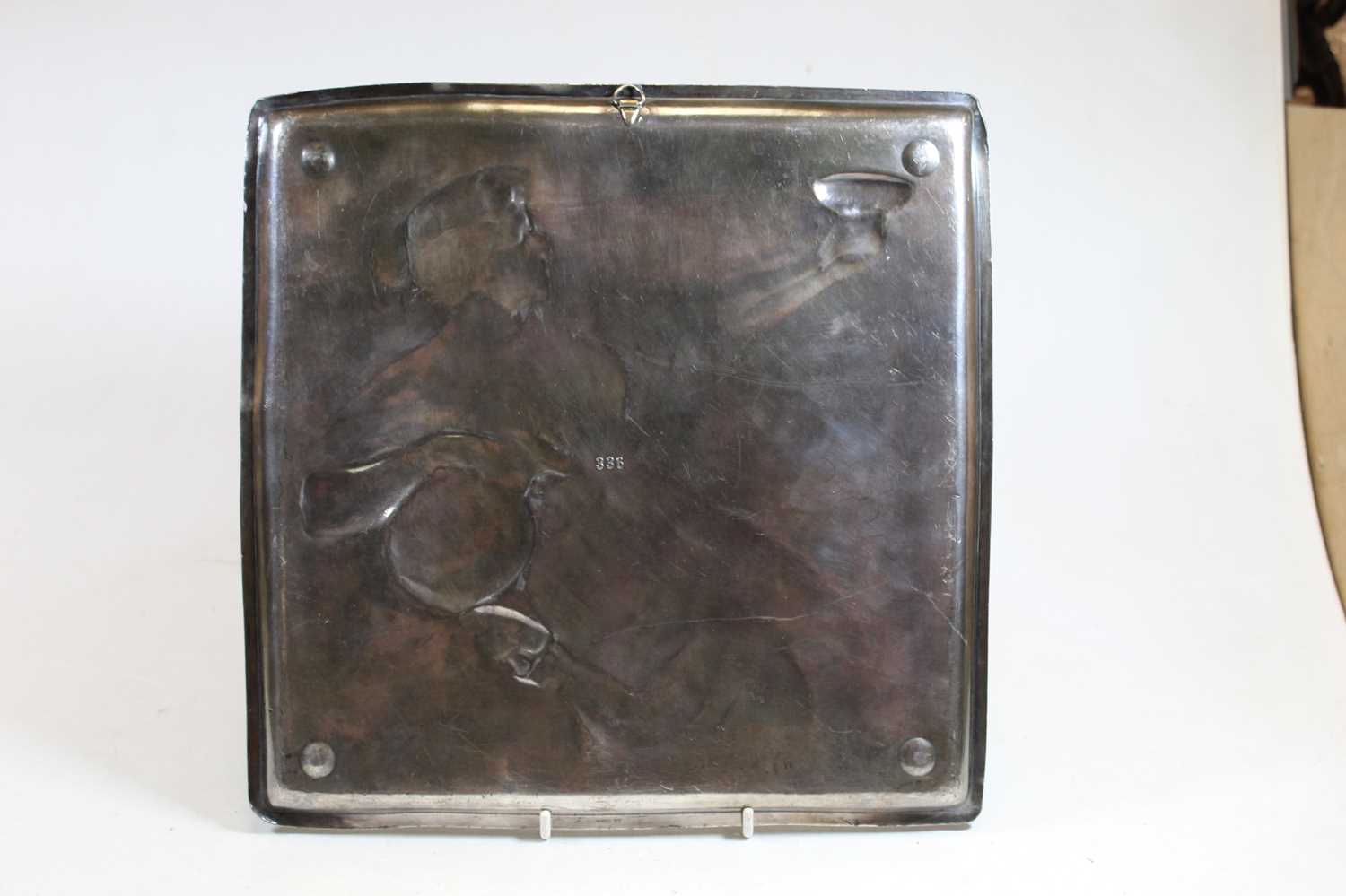 A WMF pewter square dish, relief decorated with a classical figure reclining, with Vetruvian wave - Image 2 of 2