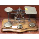 A set of brass postal scales and weights, w.25cm