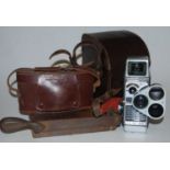 A Bell & Howell Autoset turret 8mm cine camera in fitted leather case with instruction manual,