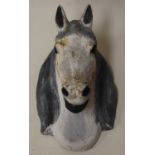 A reconstituted stone bust of a horses head, h. approx 40cm