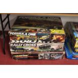 A Scalextric boxed Formula One set; boxed Rally Cross set; and a boxed Le Mans 24 hour set (3)