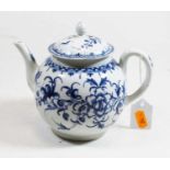 An 18th century Worcester blue and white teapot, of bullet shape, having typical floral