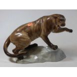 A Beswick porcelain model of a wild cat, No.1702, h.21cmCondition report: Has been repaired to the