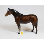 A Beswick figure of a horse, brown gloss finish, h.26cm