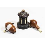An early 20th century treen bobbin jar, having removable cover, h.9cm; together with two treen light