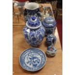 A modern Chinese blue and white jar and cover, the wrythen body decorated with flowers and fruit,