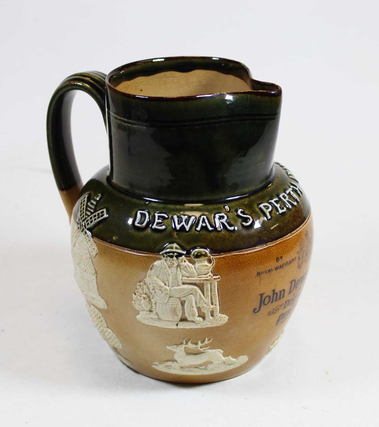 A Royal Doulton two tone stoneware Dewar's Perth Whisky advertising water jug