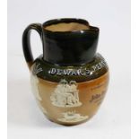 A Royal Doulton two tone stoneware Dewar's Perth Whisky advertising water jug