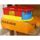 A Romanian plastic model of a garage, car not included, in original box
