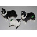 Two Beswick Border Collie sheepdogs, gloss finish, model No. 1792, together with a Beswick black