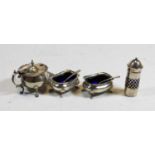 A pair of George V silver open salts, of squat rectangular form, on shall cast feet, with blue glass