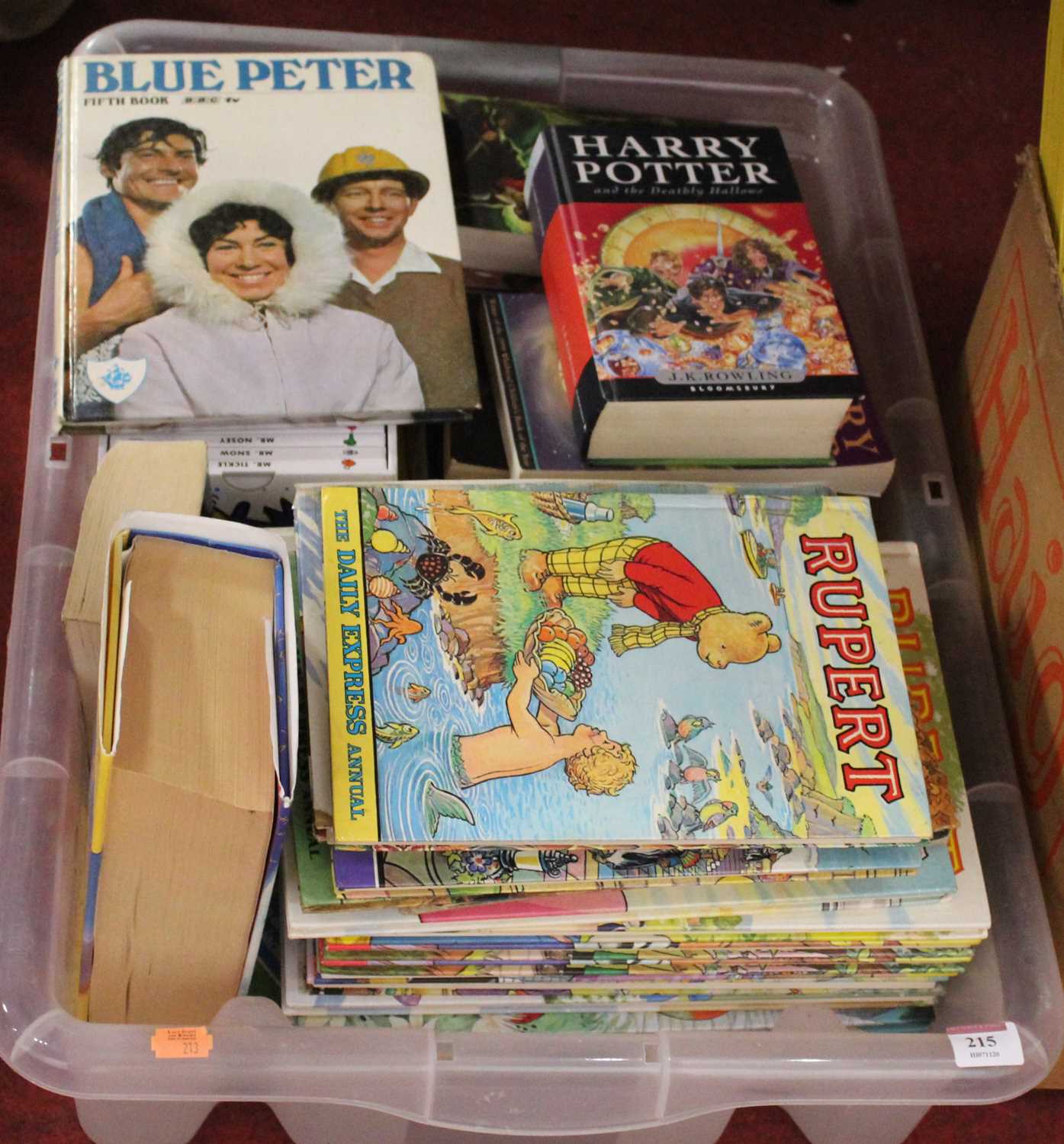 A box of miscellaneous childrens books and annuals, to include Rupert, Harry Potter & The Deathly