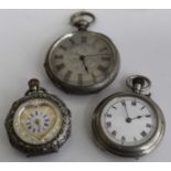 A continental silver ladies pocket watch having a heart shaped white enamel and gilded dial,