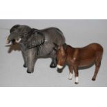 A Beswick figure of an elephant, together with a Beswick donkey model No. 1364B (2)Condition report:
