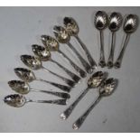 A set of ten George III silver teaspoons, each bowl having embossed leaf decoration with floral