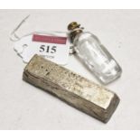 A large white metal ingot, stamped AG98 UNI and further numbered 999.9 21 0, weight 6.8oz;