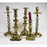 A pair of Victorian brass barleytwist candlesticks; together with three other similar, the largest