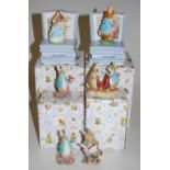 Two World of Beatrix Potter musical figures to include Peter Rabbit and Hunker Munker, boxed,