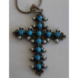 A contemporary white metal faux turquoise and faux pearl set cross pendant, 7cm, on finelink neck