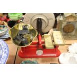 A set of cast iron and brass grocers scales and weights, bearing a label for Marsden's Weighing