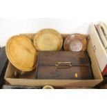 A 20th century oak cutlery case, 40cm; together with two bread-boards; and a dish (3)