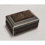 An Indian carved hard wood micro mosaic inlaid desk top box, width 15cm