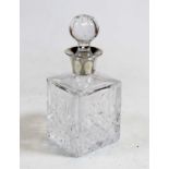 A cut glass decanter and stopper, having silver collar, h.16cmCondition report: Overall condition is