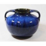 A Denby blue glazed twin handled vase, H17cmCondition report: Interior is quite grubby and scaly.
