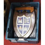 A collection of painted wooden heraldic crests, each mounted on an oak shield to include Essex,
