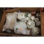 A box containing a collection of various ceramics, to include a Royal Doulton porcelain figure '
