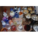 A box of mixed chinawares to inc. cottages, glass paperweights, plated goblets etc.