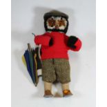 A 20th century Abercrombie and Fitch advertising soft toy in the form of an owl dressed as a