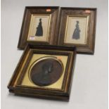 A pair of Victorian full length silhouettes 13x7cm in beechwood frames, together with bronzed
