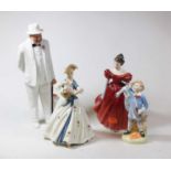 A Royal Doulton figue of Sir Winston Churchill, H27cm, together with two other Royal Doulton figures