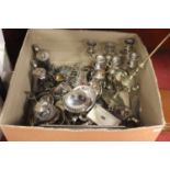 A box of miscellaneous silver plated wares, to include a pair of three-branch table