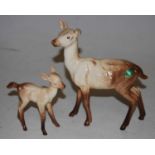 A Beswick doe, model No. 999A, together with a Beswick fawn, model No. 1000B (2)