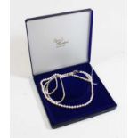 Two pearl necklaces, each with 9ct clasps