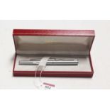 A Scheaffer cased brushed metal fountain pen