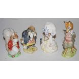 Four Beswick Beatrix Potter figures to include Foxy Whiskered Gentleman having gold back stamp