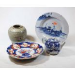 A 19th century Chinese blue and white export porcelain plate, dia.23cm; together with a Japanese