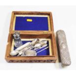 A box containing a collection of various silver, to include a Port decanter label, apostle spoons,