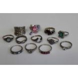 A quantity of various silver and white metal dress rings