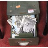 A Veteran patent single filing drawer containing various postcards